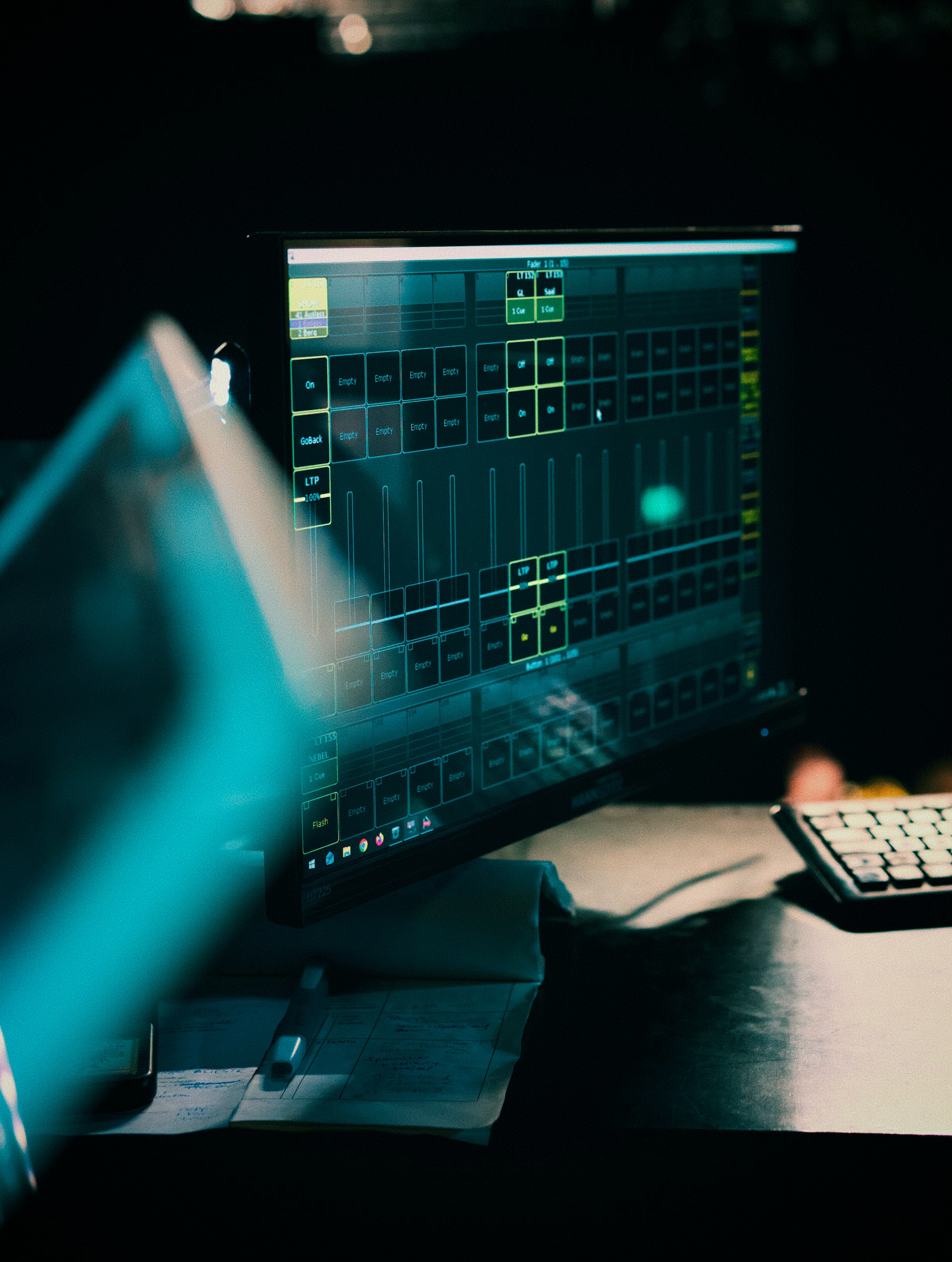Lighting control console screen at a live event production desk